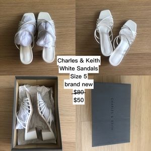 Brand new white sandals in size 5
